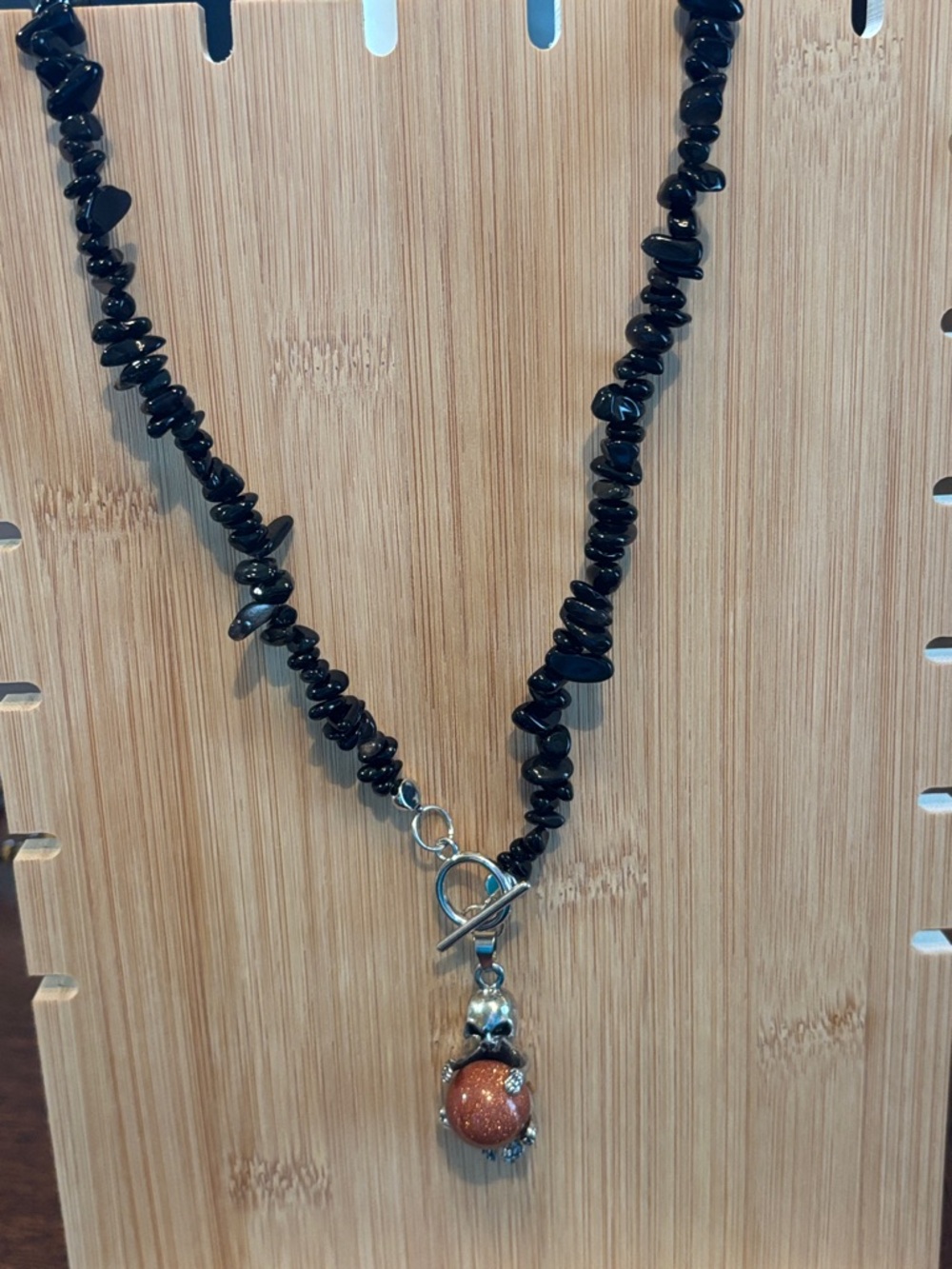 Black Beaded Necklace with Goldstone Turtle Pendant